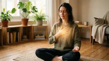 Woman practicing inner child healing meditation with self-compassion, hands over heart