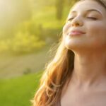 a woman doing resonant breathing