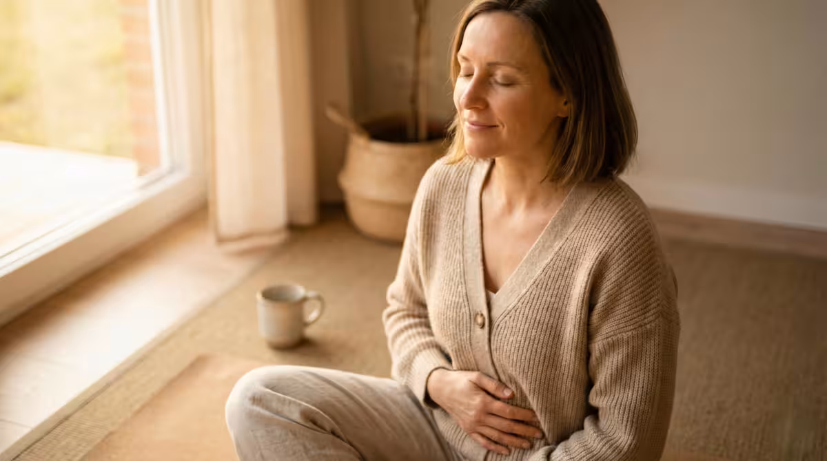 Woman practicing box breathing technique for root chakra balance