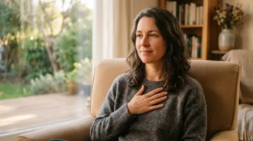 A person in a chair using nervous system repatterning to heal.