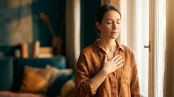 A person practicing somatic awareness of their nervous system state.