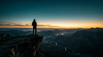 The Family Scapegoat who finally escaped is looking over a cliff at the world.